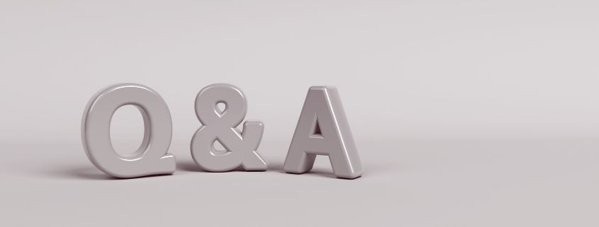 Letters Q & A on a grey background