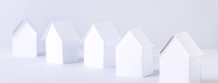 An image of white miniature houses